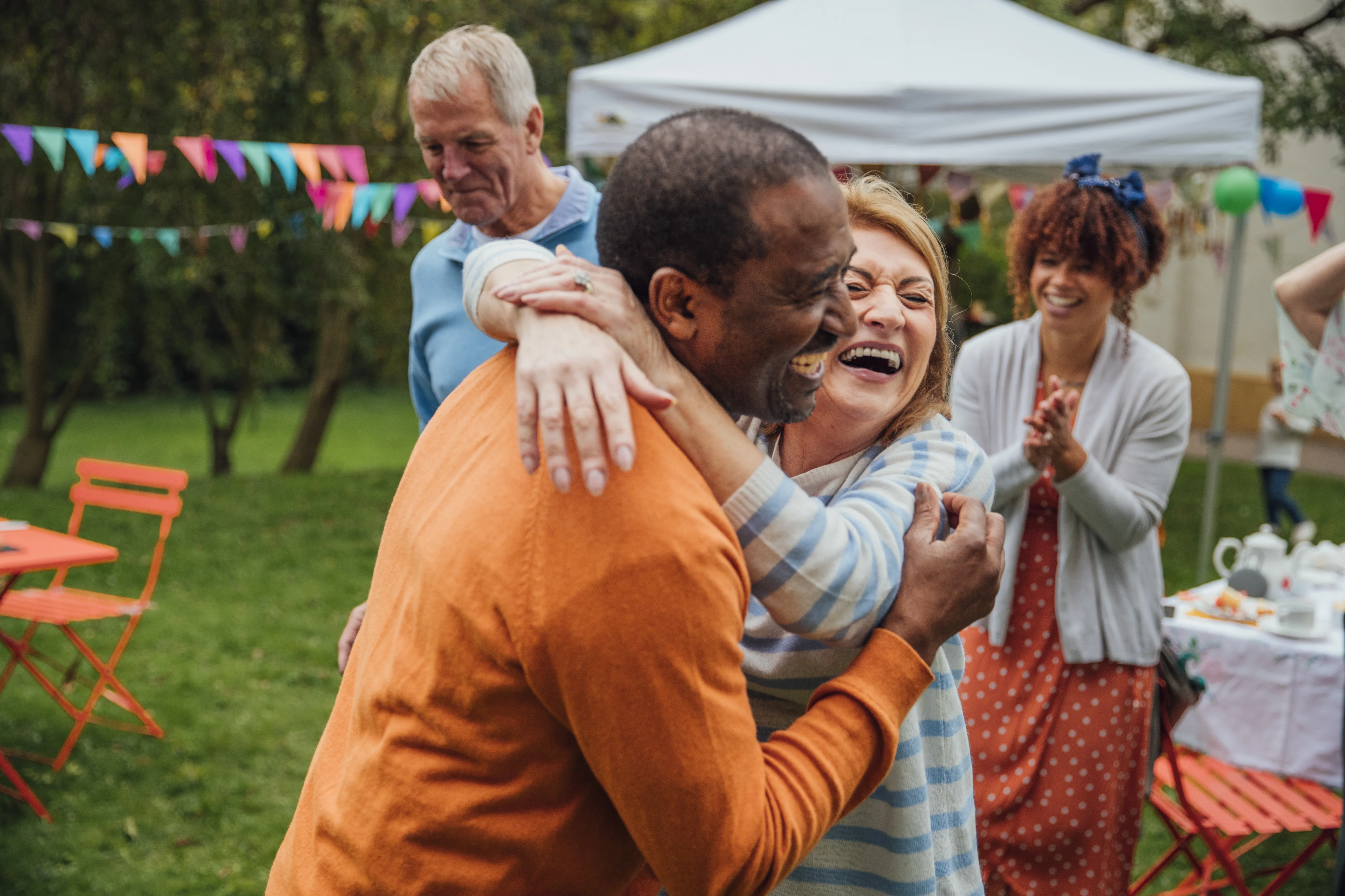 a man holding a woman