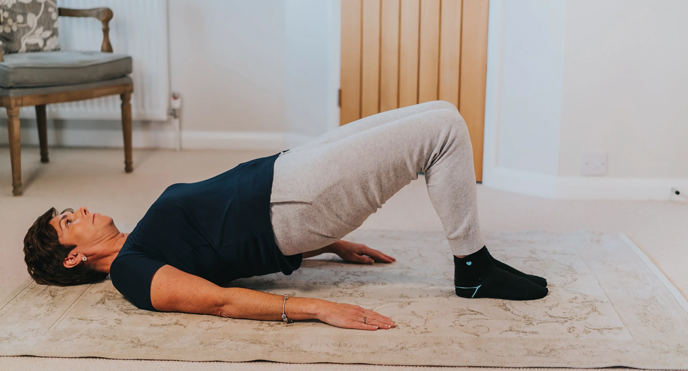 a person doing a plank on the floor