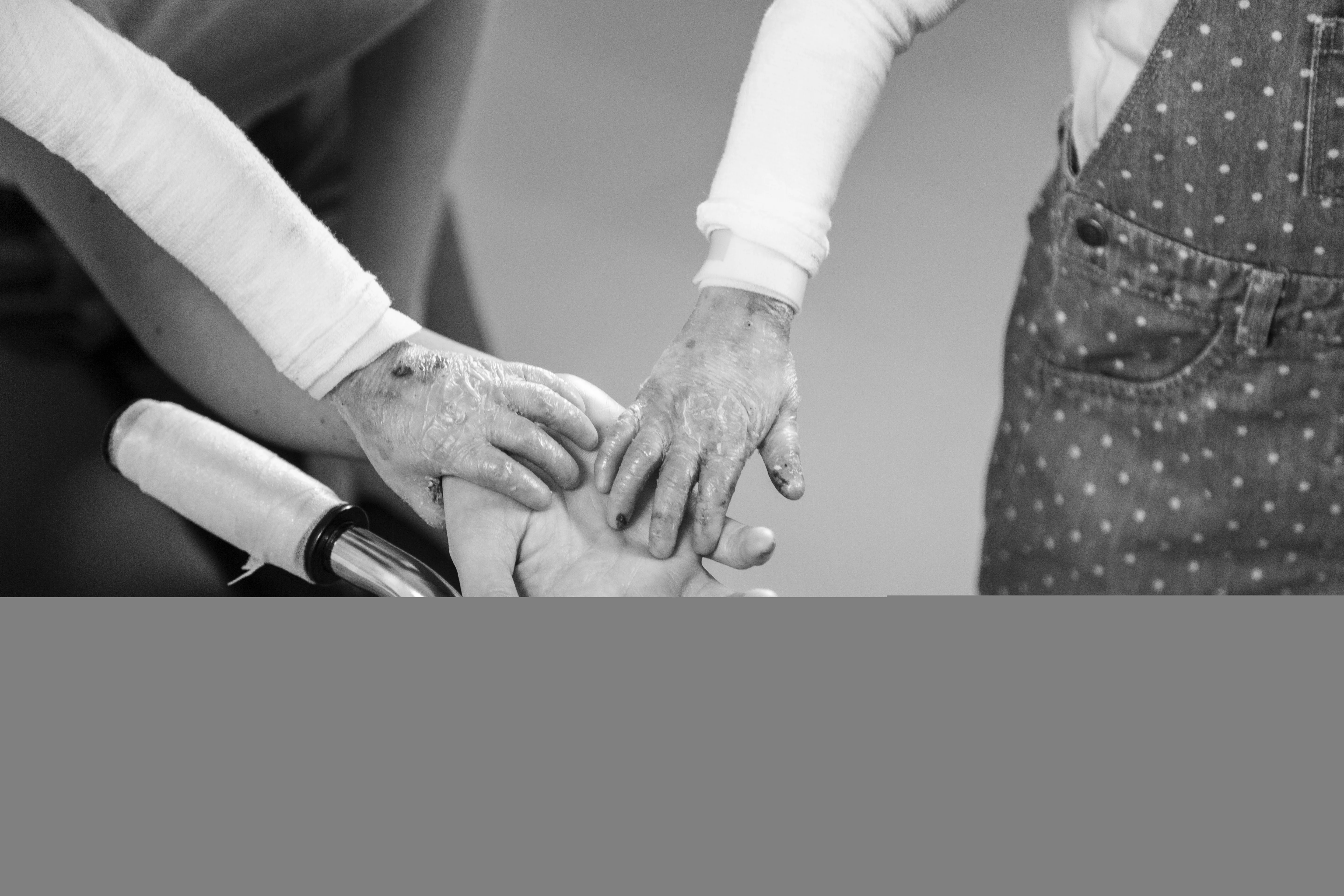 close-up of people shaking hands